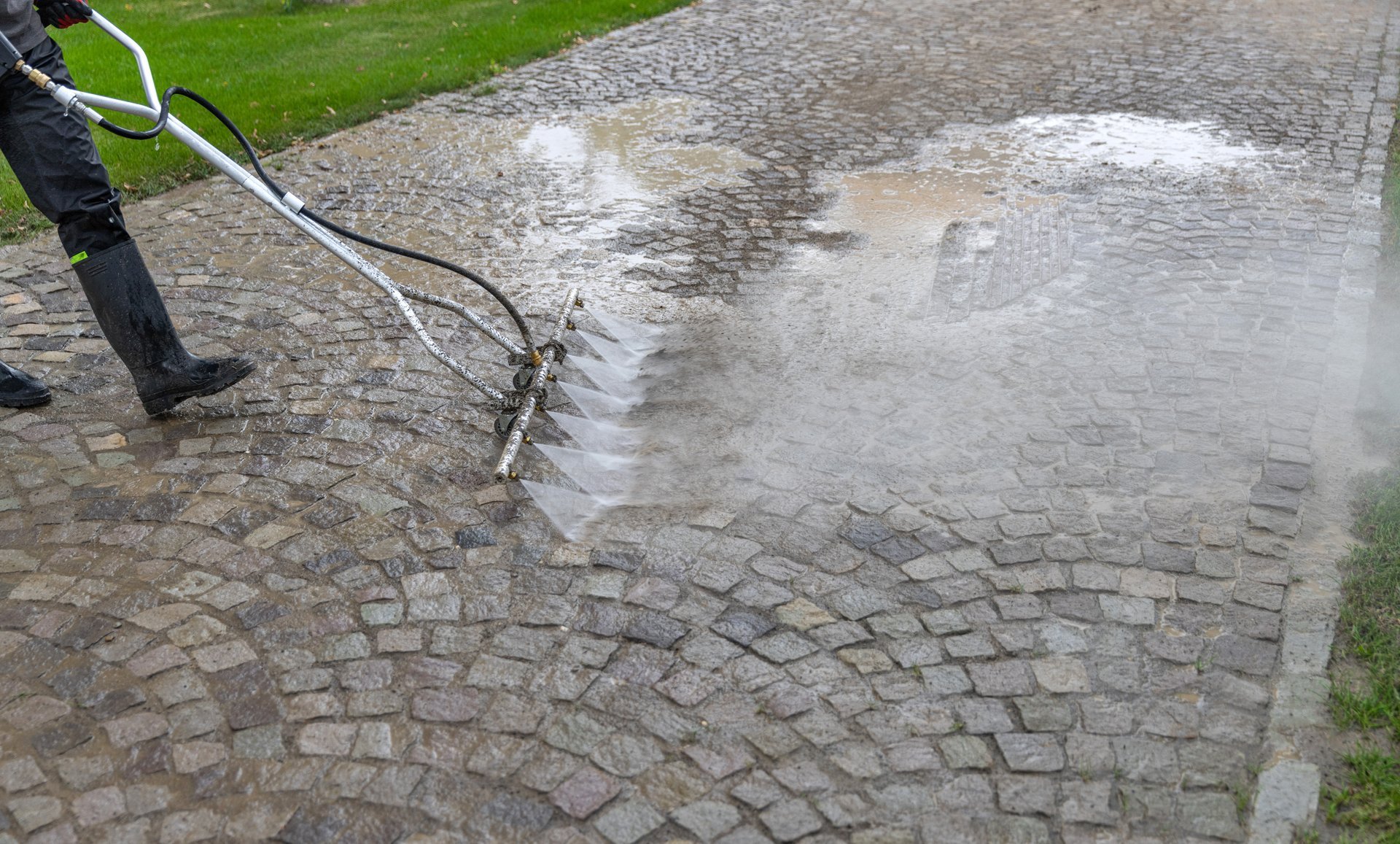 Power washing concrete surfaces